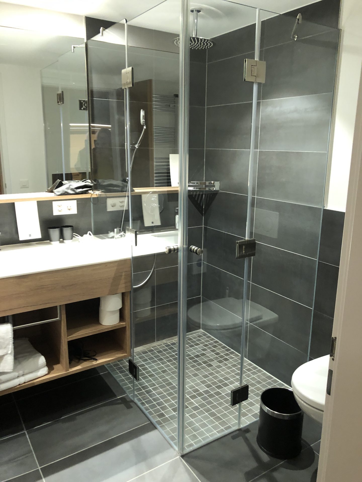 The ultra modern black and grey bathroom in our apartments,