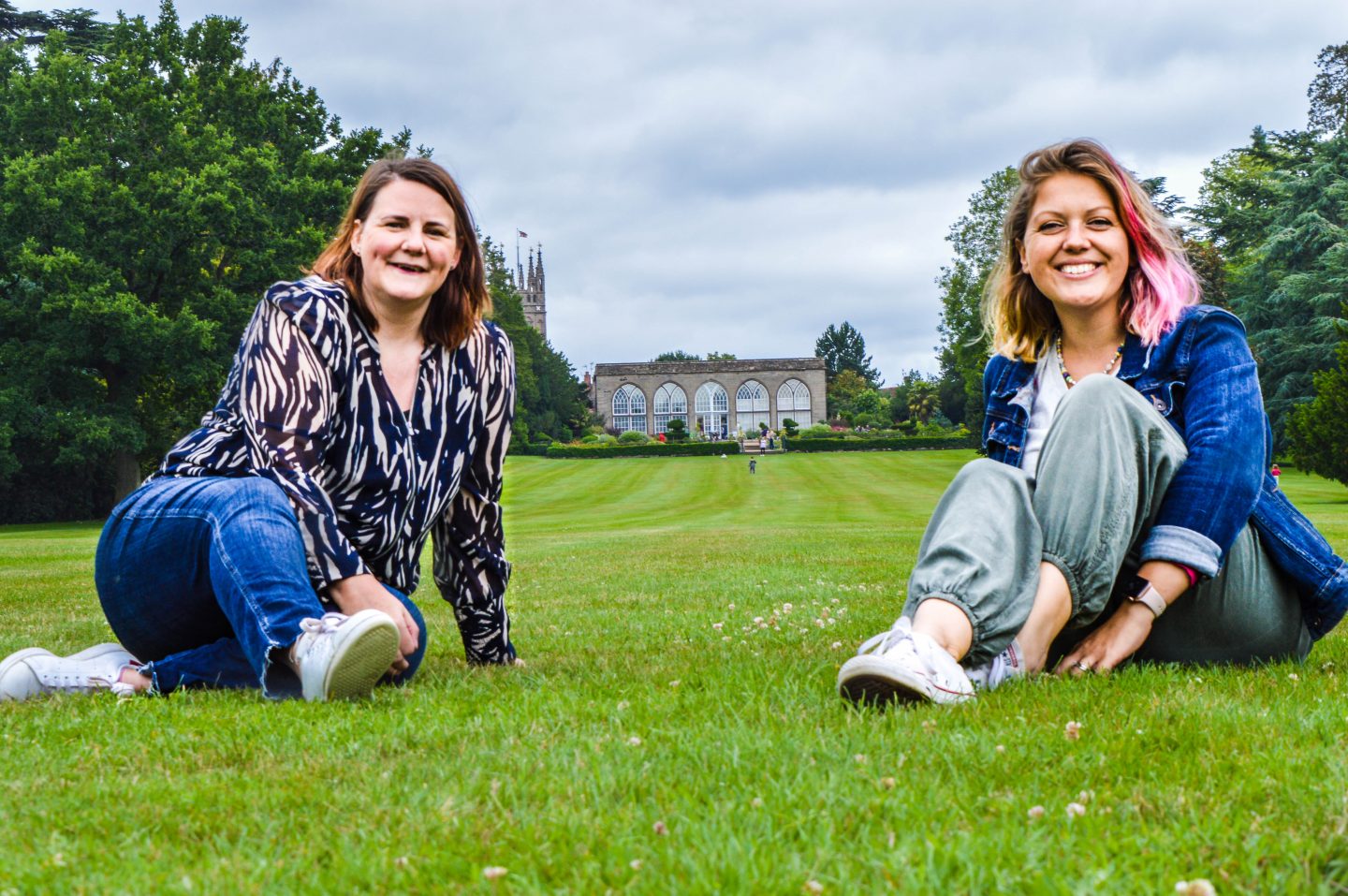 Emma Bradley and Louise Williams sit on the grass, co-founders of Top Blog Coaching, another of my lockdown silver linings.