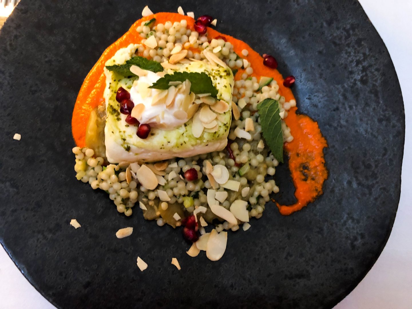 Vegetarian main course of char grilled halloumi,